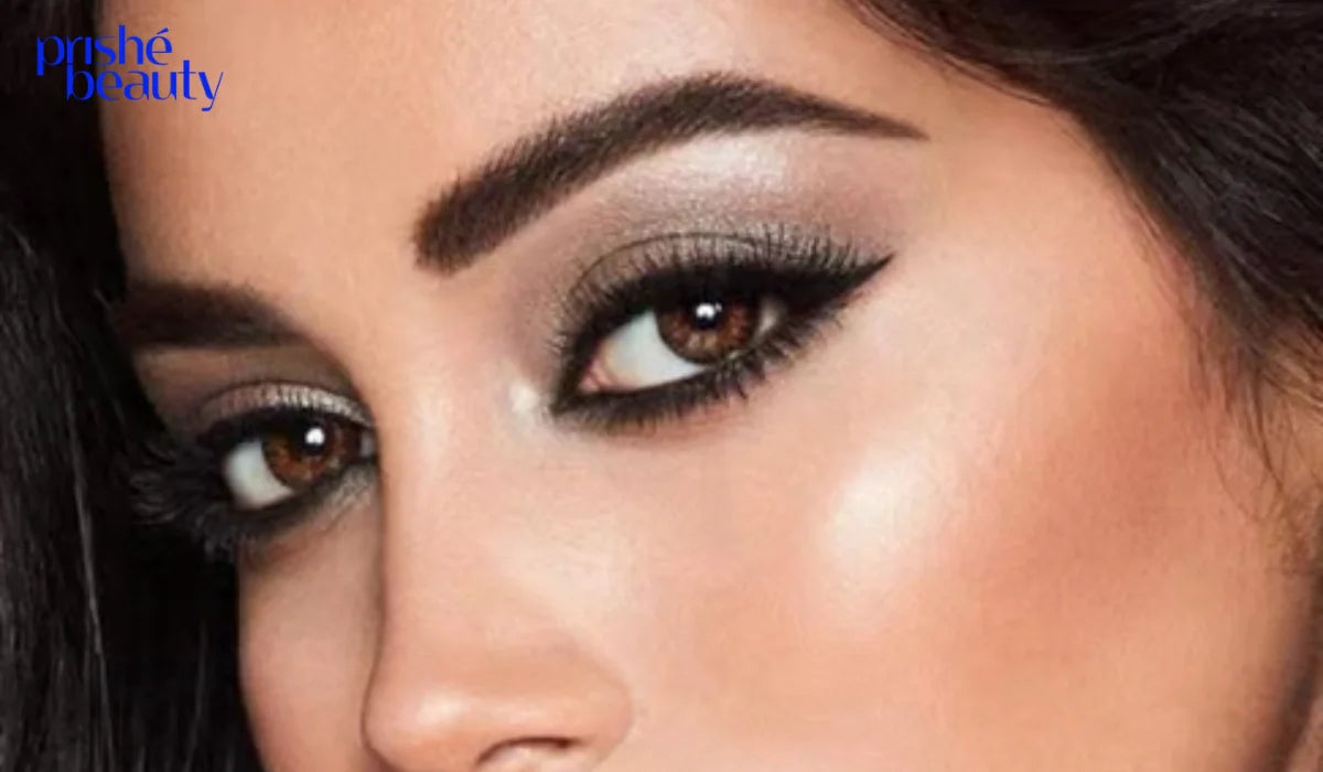 Woman applying kajal eyeliner makeup for bold and beautiful eyes