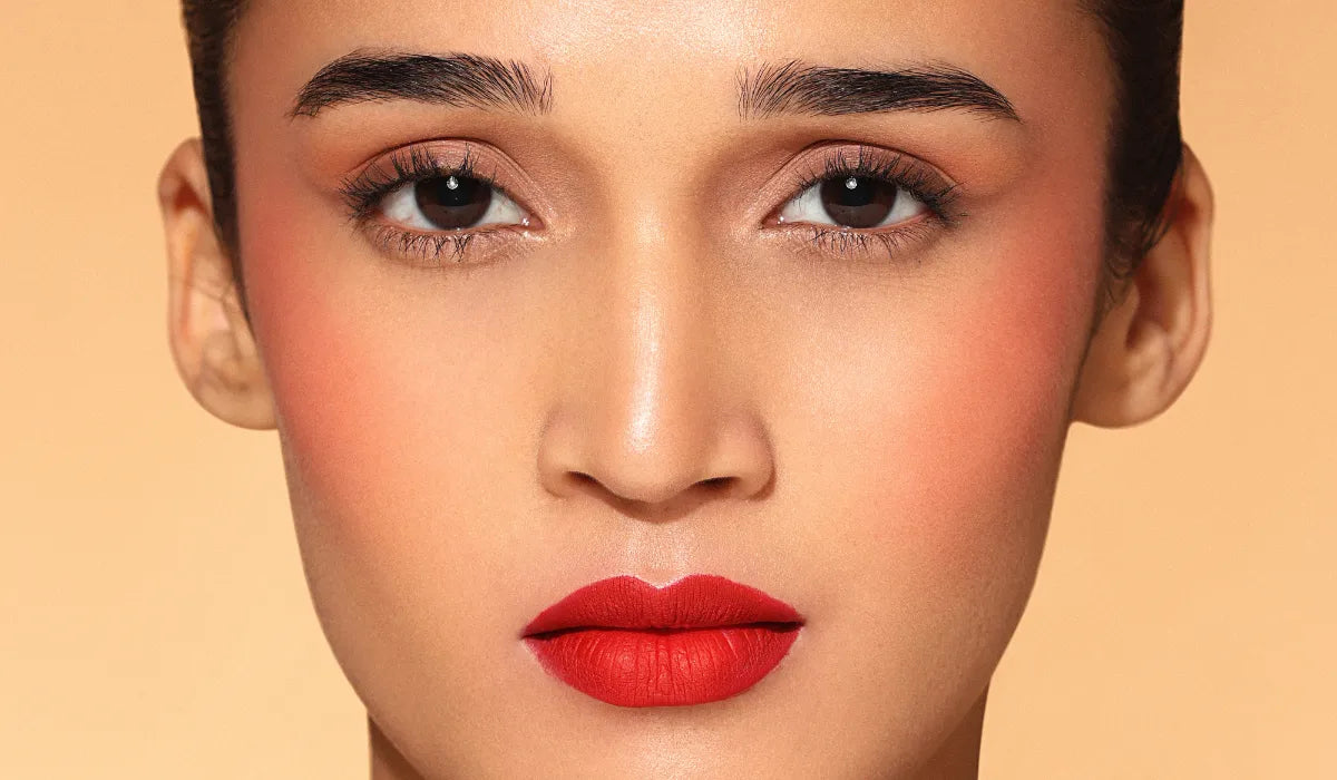 Indian bride wearing perfect red lipstick for wedding makeup look